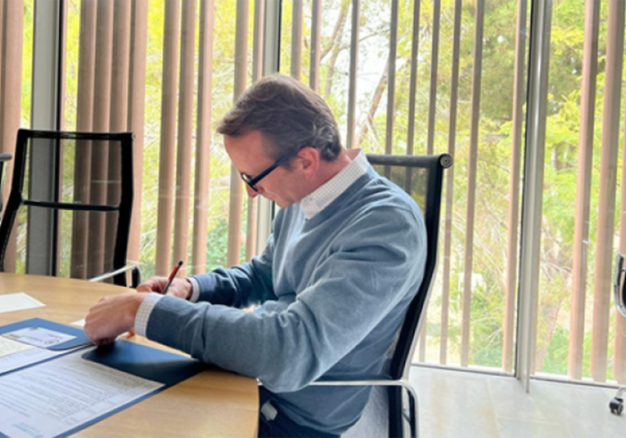 Dr. Chet writing
